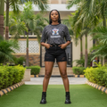 Women's black all-over geometric text pattern cartoon graphic boxy tee - model shot