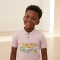 Nigerian boy model wearing Boys Graphic Polo Shirt