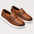 Brown perforated ring loafer pair on a clean background