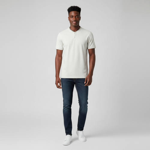 Young Nigerian male wearing light stone Henley black tipped polo shirt