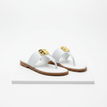 Men's white leather gold emblem thong sandals pair on white platform