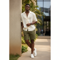 Unisex utility shorts on Nigerian male model in olive green
