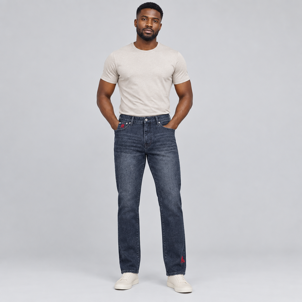 Black Nigerian man wearing dark blue straight jeans with red accents