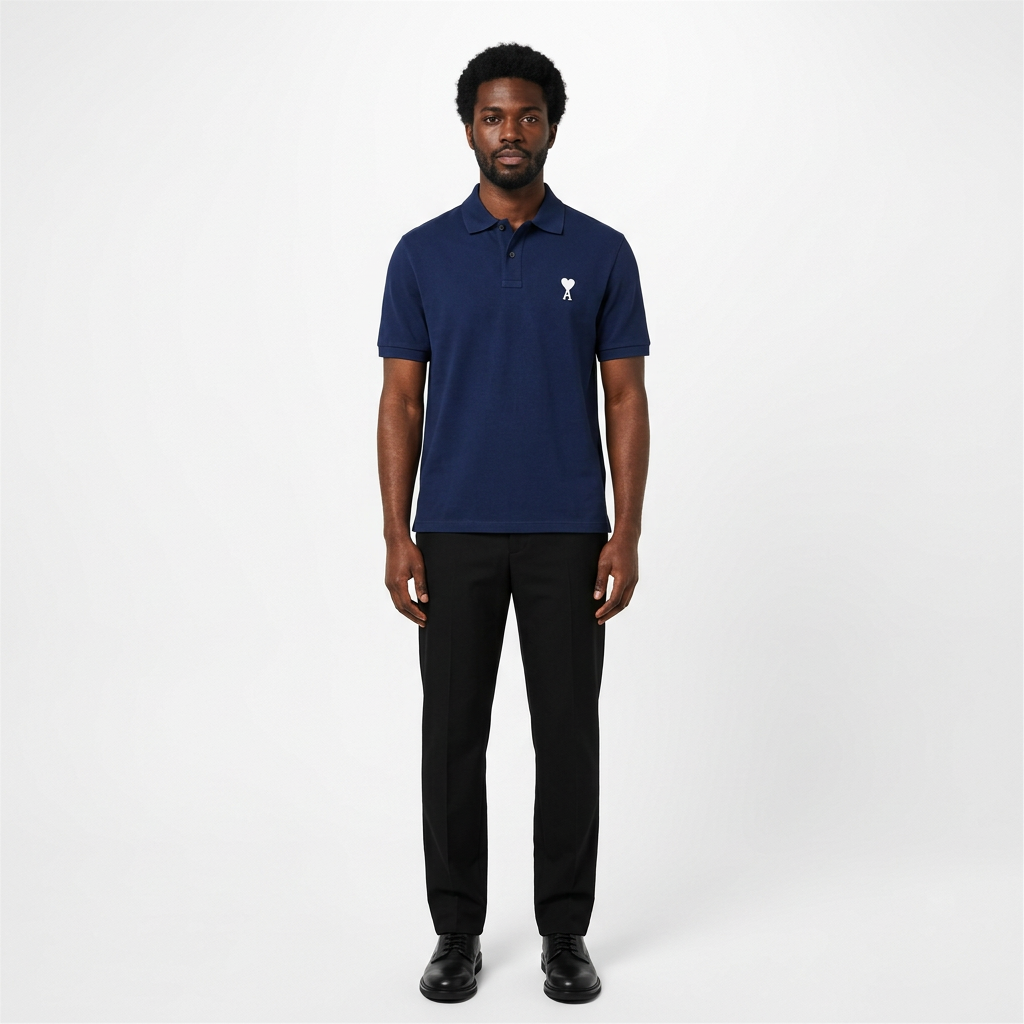 Full-body adult Black man wearing a navy white heart-detail polo