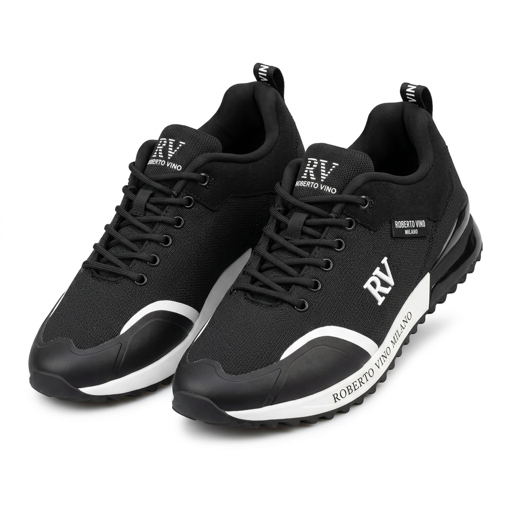 Pair of charcoal mesh sneakers with curved white trim and black-and-white soles on white