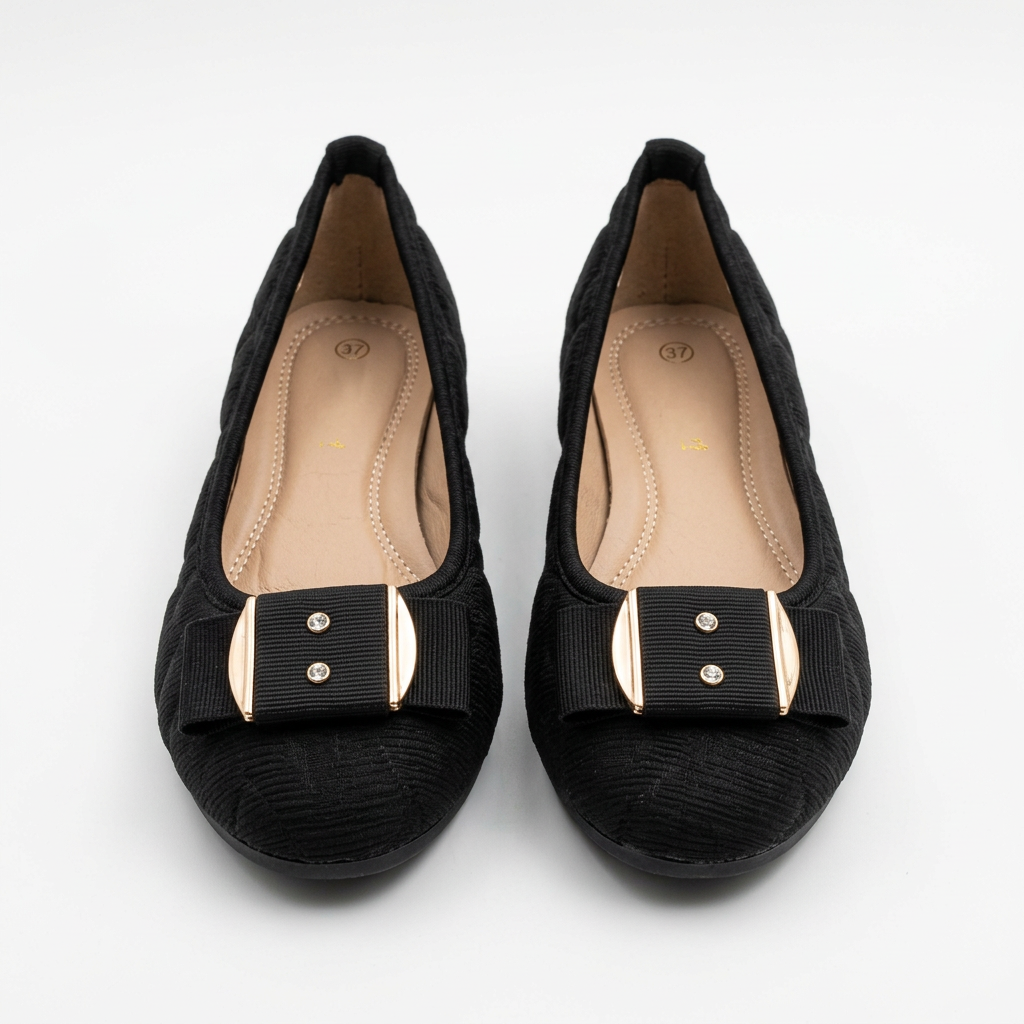 Complete pair of girls’ black textured gold-trim ballet flats without support rods