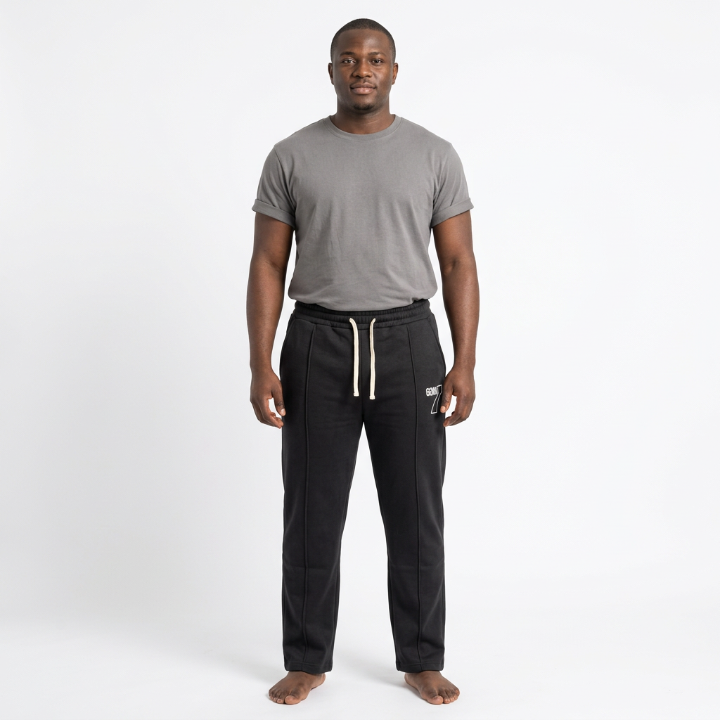 Adult Black male model wearing black number-print drawstring joggers