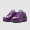 Purple layered-panel lace-up sneaker pair on a light grey background