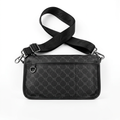 Black patterned crossbody bag with wide adjustable strap and ring-pull front zip on white background