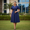 Nigerian female model wearing navy blue flutter sleeve belted A-line midi dress