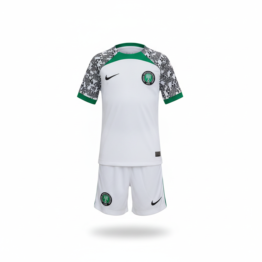 White kids football jersey and shorts ghost mannequin matching the model design with black geometric sleeves and green trim