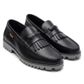 Corrected black fringe loafers showing layered rounded tabs and grey lug soles