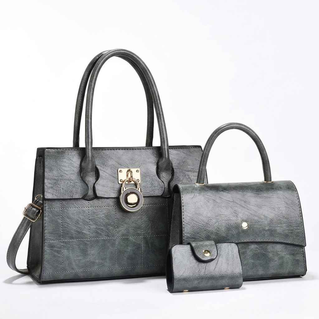 Grey textured three-piece handbag and wallet set on a white background
