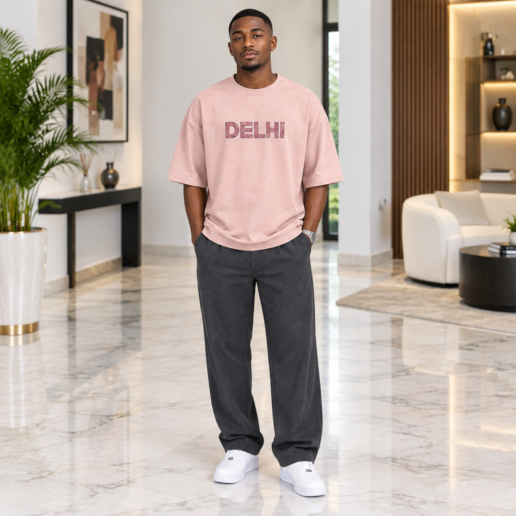 Man wearing dusty rose Delhi graphic tee