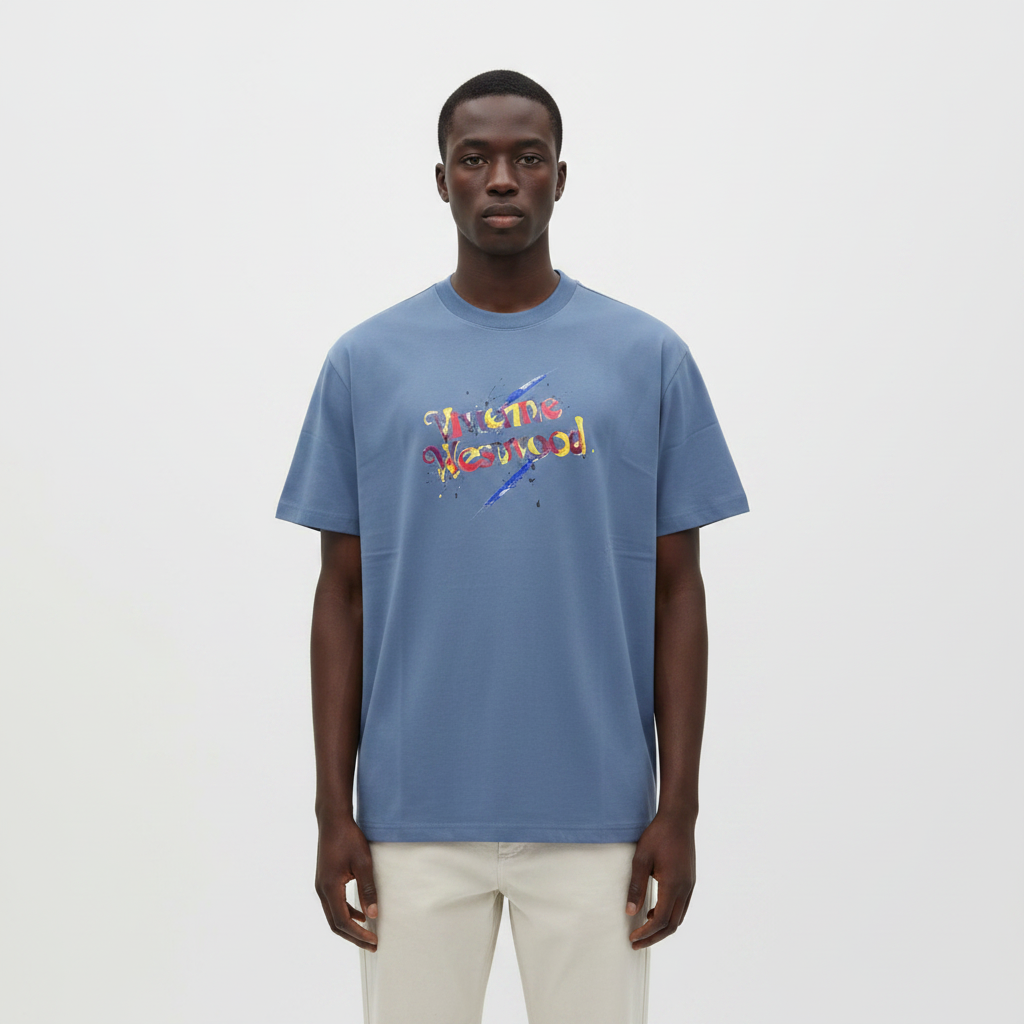 Model wearing the dusty blue painted script graphic t-shirt