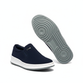 Men's navy blue suede slip-on sneaker pair front and sole view on white background