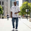 Nigerian male model wearing White All-Over Black Abstract Brushstroke Scribble Print Short-Sleeve Button-Down Shirt