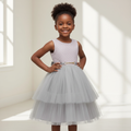 Girls grey tiered tulle party dress on Nigerian child model