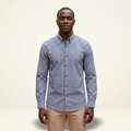 Male model wearing a navy and white gingham long-sleeve shirt against a plain off-white background