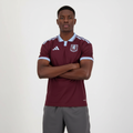 Nigerian male model wearing Aston Villa home jersey