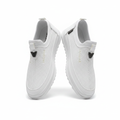 Jaguar all-white perforated slip-on sneaker ghost mannequin product shot, plain white background