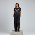 Nigerian female model wearing Black Monogram Print Co-ord Tracksuit Set - front view