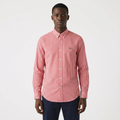 Adult Black model wearing a red and white fine-check long-sleeve shirt