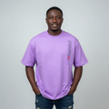 Model wearing lilac Impossible slogan tee