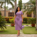 Nigerian female model wearing Women's Lavender Diagonal Fringe Midi Gown