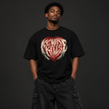 Young Black Nigerian man wearing gothic dark red heart graphic oversized black tee