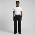 Full-body male model wearing black wide-leg denim jeans