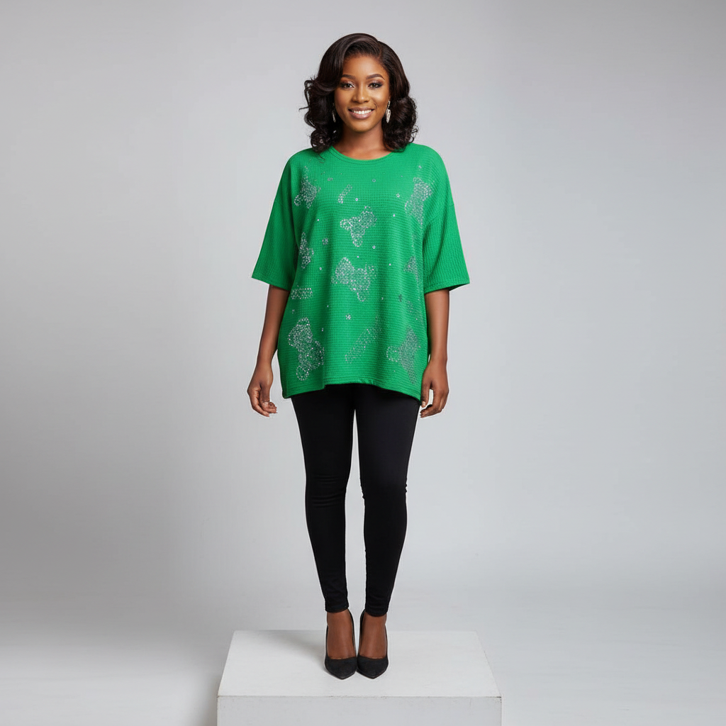 Nigerian female model front view styled - green rhinestone floral cluster top