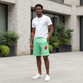 Young Nigerian male model wearing Mint Green Motivation Graphic Shorts