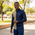Nigerian male model wearing Navy and Mustard Yellow Plaid Split-Panel Long-Sleeve Button-Down Shirt with Embroidered Dog Motif