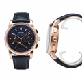 Men's rose gold chronograph black dial moon phase watch — ghost mannequin front and side view, black leather strap