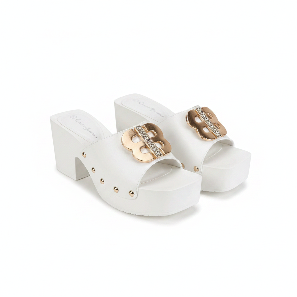 Ghost mannequin pair view of white chunky platform block heel mules with gold logo buckle and studs