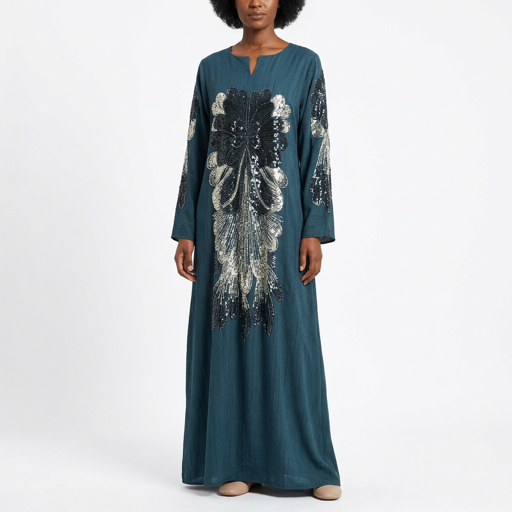 Black female model wearing the deep teal shimmer-motif abaya