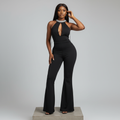 Nigerian model wearing black rhinestone halterneck flared jumpsuit