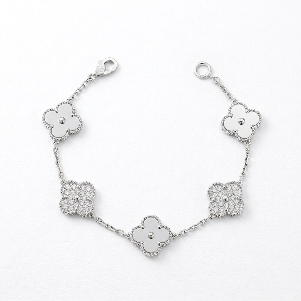 Silver-tone clover bracelet with alternating polished and stone-set charms