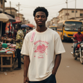 Young Nigerian male model wearing planet graphic cream tee