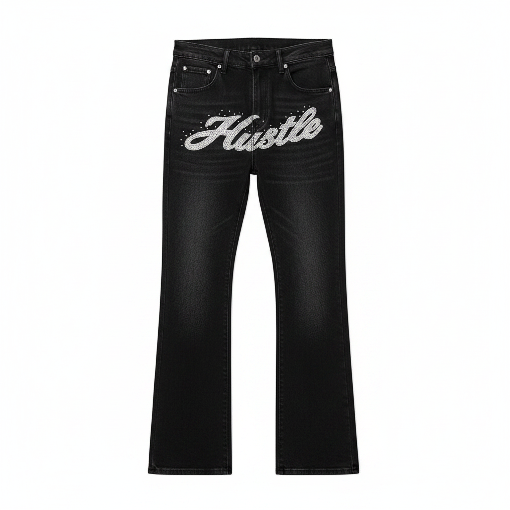 Men's black flared denim jeans with silver rhinestone cursive script graphic, ghost mannequin front view