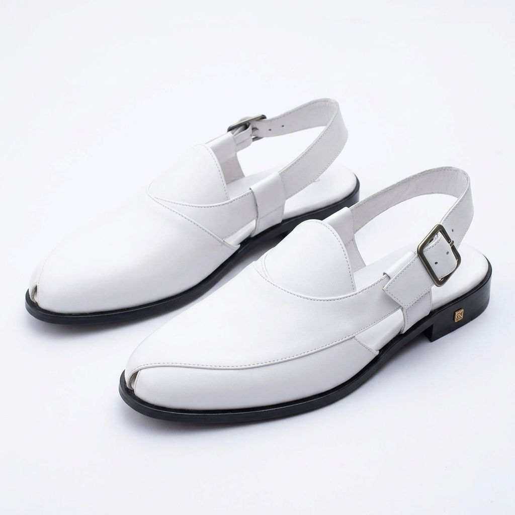 White closed-toe slingback shoes with buckle straps and black low heels