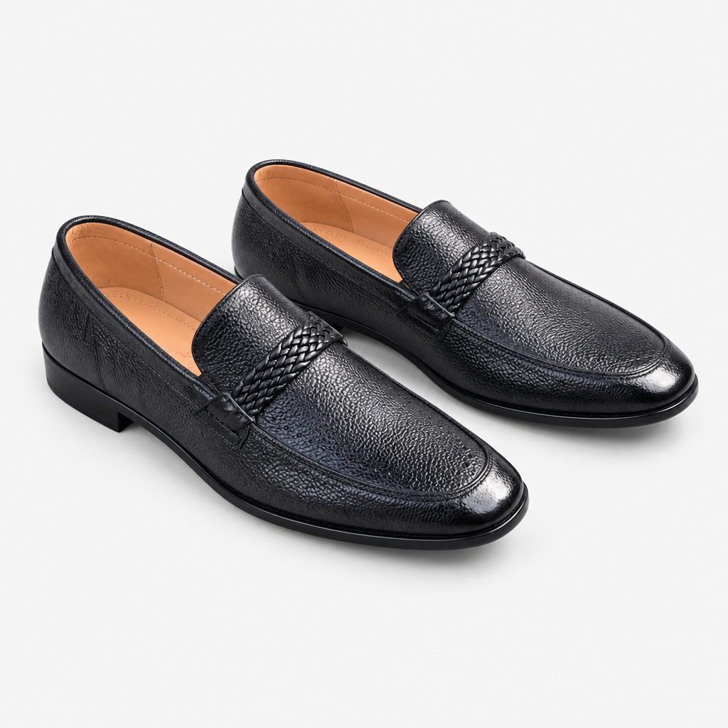 Black men's textured loafers with woven strap detail shown as a complete pair