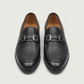 Men's black leather loafers with silver-toned buckle detail, front view