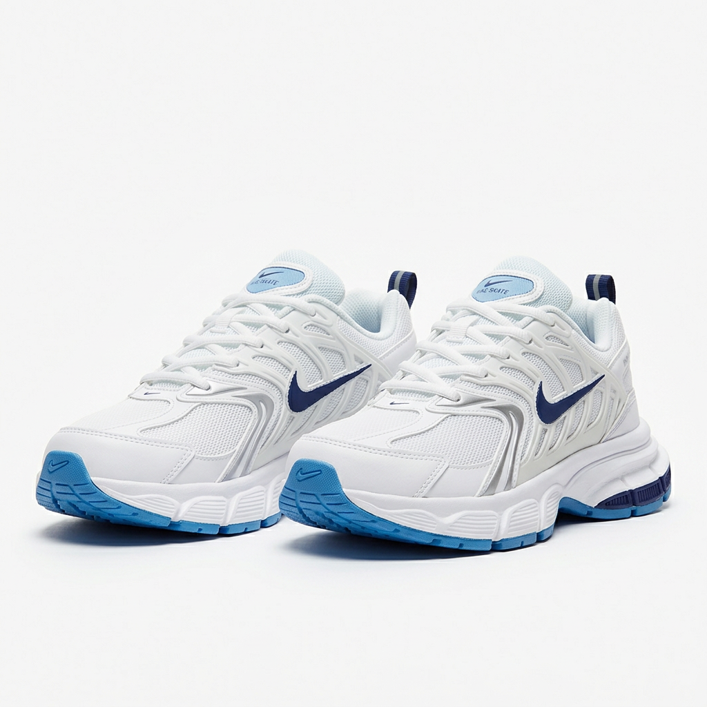 Pair of white mesh-panel sneakers with blue accents on a white background