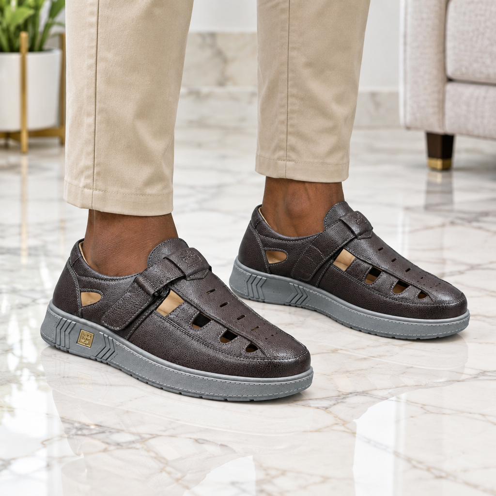Man wearing brown pebbled leather fisherman sandal shoes