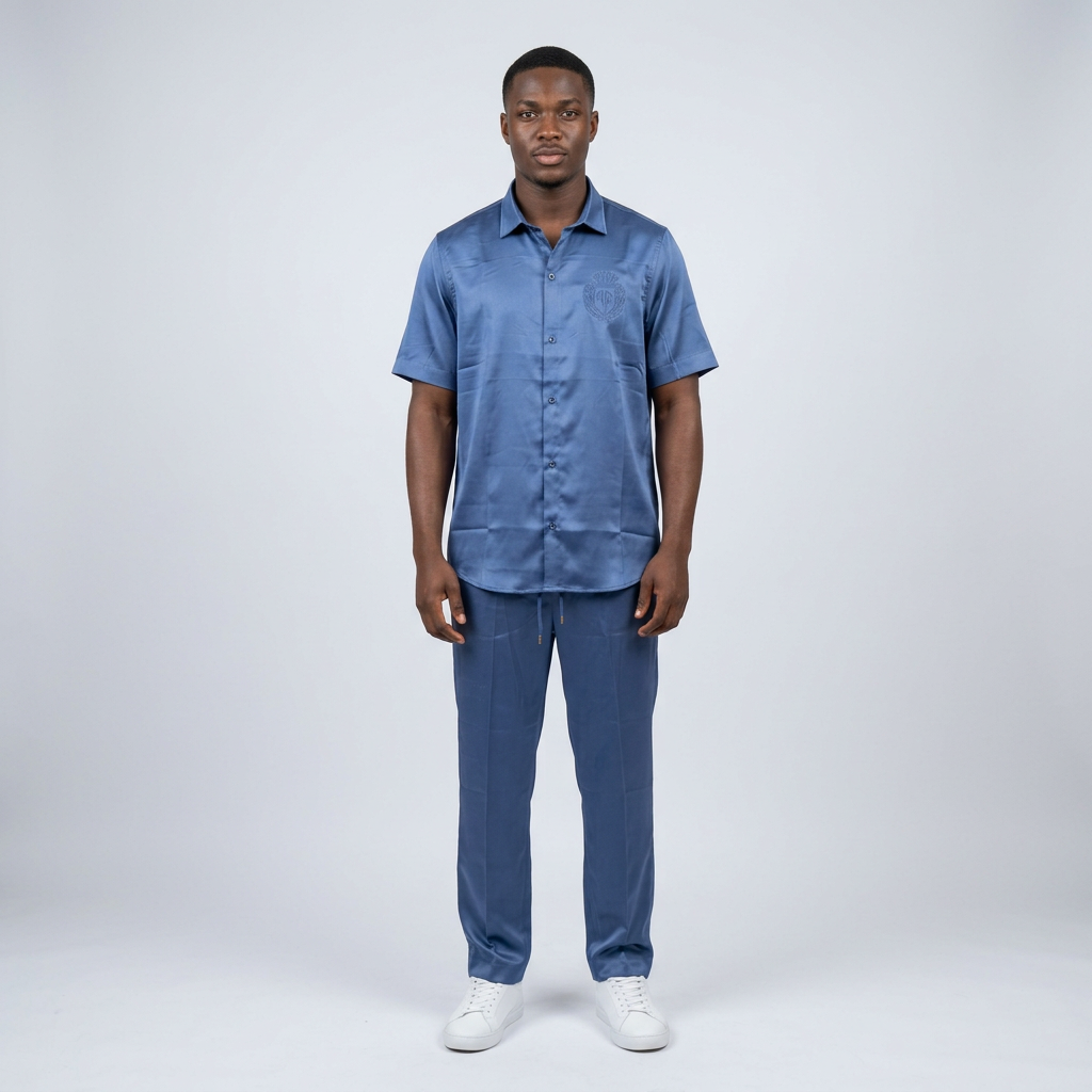 Nigerian man wearing blue shirt and drawstring trouser set