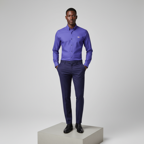 Nigerian male model wearing royal purple plain long-sleeved shirt, front view
