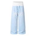 Light-blue wide-leg trousers with white outlined cross graphic