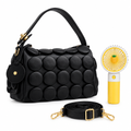 Black circle-appliqué shoulder bag with matching strap and yellow handheld fan on white background